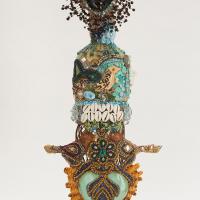 "Transcend," Glass, clay, metal, sequins, mirrors, cowrie shells, 26" x 10" x 7," by Oletha DeVane